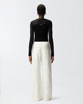 Jeans wide leg con motivo a rombi e strass - | Pinko