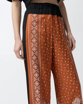 Lightweight wide-leg trousers with bandana print - | Pinko