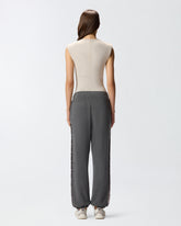 Laminated-print fleece joggers - | Pinko