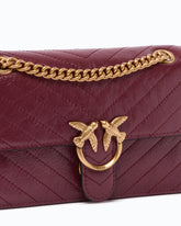 Petit sac à main Mini Love Bag One Light en cuir à chevrons - Bordeaux | Pinko