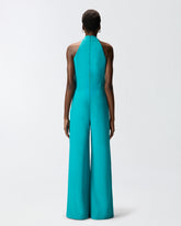 Długi kombinezon z dekoltem typu halter i biżuteryjnym dodatkiem - | Pinko