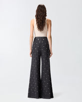 Wide-leg jeans in dark denim with eyelets - | Pinko