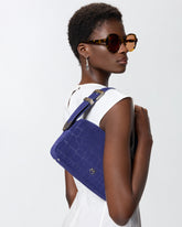 Medium crossbody bowler bag in crocodile-print leather - Purple | Pinko
