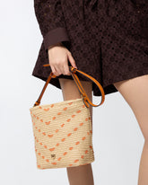 Petit sac à bandoulière Bucket Mini en raphia à chevrons - Multicolore Jaune-Orange | Pinko