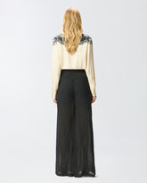 Lightweight trousers with laces and Texan details - | Pinko