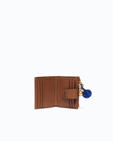 Portefeuille multifonction en cuir avec pompon - | Pinko