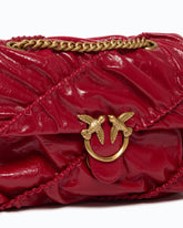 Mini Love Bag Puff crossbody bag in quilted new shiny leather - Red | Pinko