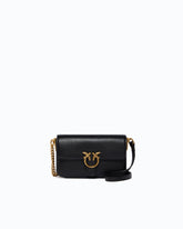 Baby Love Bag One Slouchy crossbody bag in new biker leather - Black | Pinko
