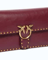 Borsa a tracolla media Love One Slouchy in pelle con borchie - Bordeaux | Pinko