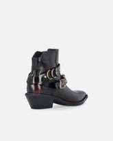 Studded cowboy boots - | Pinko