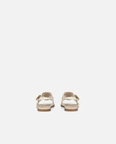 Flat sandals with straps and studs - | Pinko