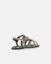 Sandalias planas de piel con estampado de pitón y tachuelas - | Pinko