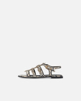Sandalias planas de piel con estampado de pitón y tachuelas - | Pinko