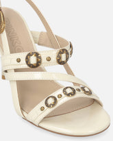 Sandalias destalonadas altas con correas y tachuelas - | Pinko