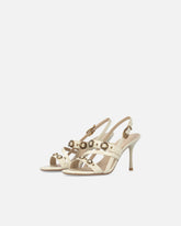 Sandalias destalonadas altas con correas y tachuelas - | Pinko