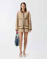 Minigonna in tweed con profili similpelle e zip -  | Pinko