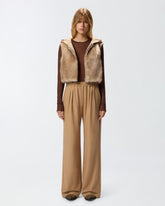 Gilet rembourré en fourrure synthétique à capuche -  | Pinko