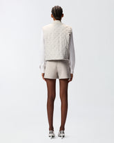 Gilet trapuntato con strass e borchie -  | Pinko