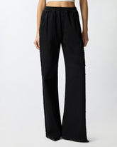 Pantaloni in denim con banda laterale in pizzo -  | Pinko