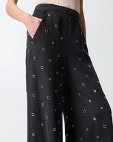 Vaqueros wide-leg en denim oscuro con ojales -  | Pinko