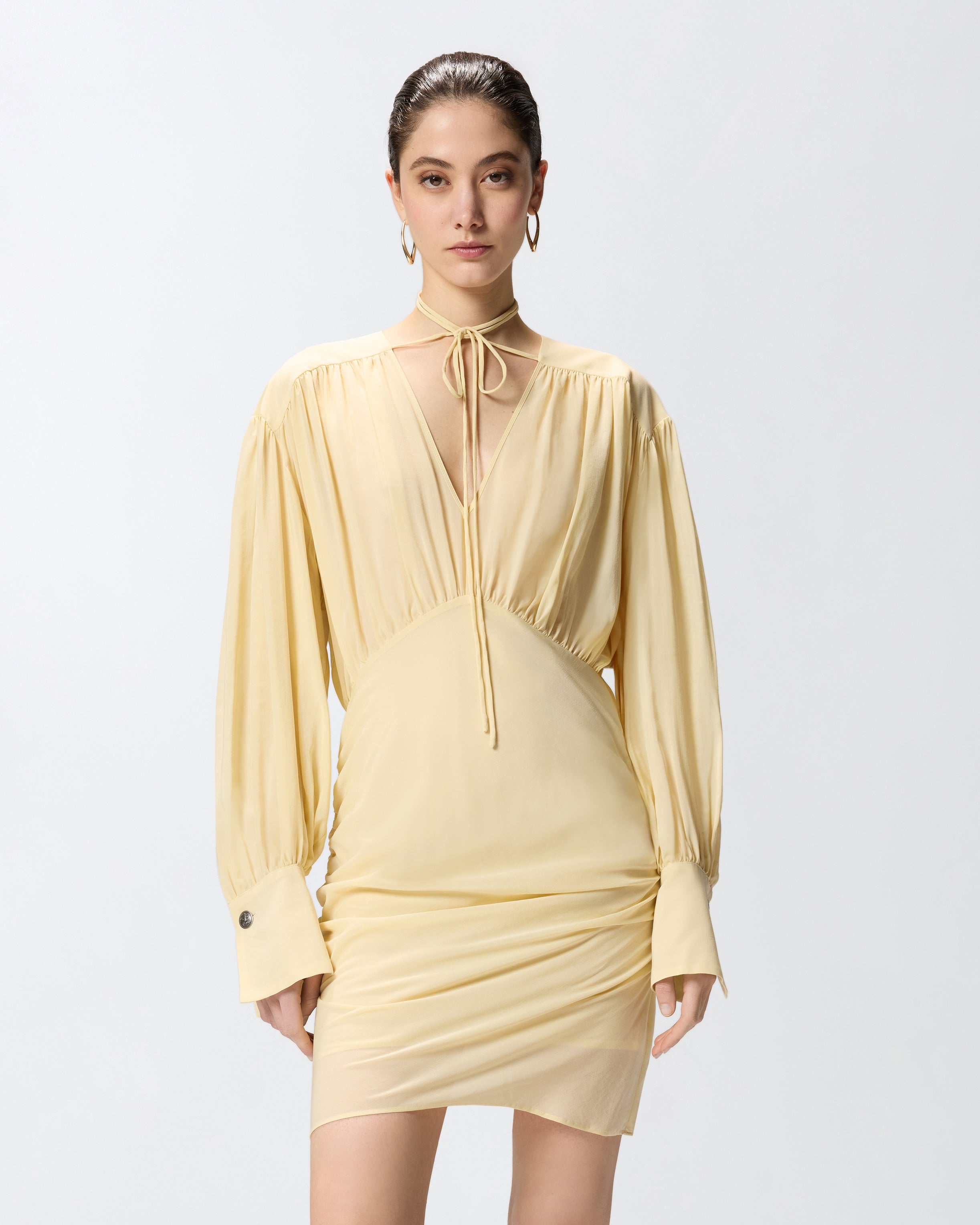Mini dress with long sleeves and draping Mini dress with long sleeves and draping