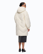 Long quilted down jacket with hood -  | Pinko