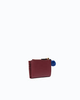 Portefeuille multifonction en cuir avec pompon -  | Pinko