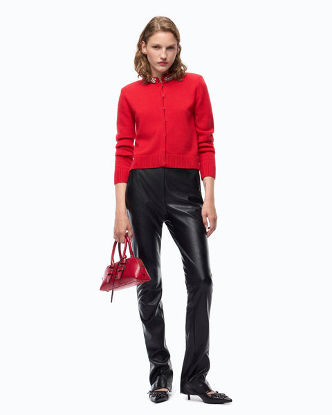 Pantaloni slim fit svasati effetto nappa