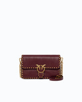 Small Love One Slouchy crossbody bag in leather with studs - Bordeaux | Pinko