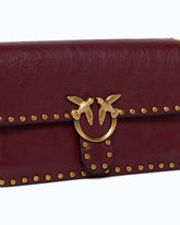 Small Love One Slouchy crossbody bag in leather with studs - Bordeaux | Pinko