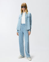 Pantaloni in denim con logo Love Birds -  | Pinko