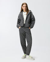 Sporty trousers with all-over Love Birds logo -  | Pinko