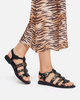 Sandali bassi con cinturini e borchie -  | Pinko