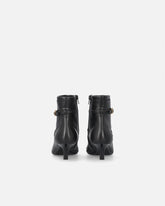 Botas con correas y tachuelas joya -  | Pinko