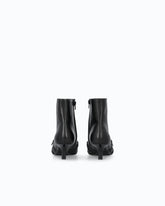 Knöchelhohe Stiefeletten aus Leder mit Riemchen und Fransen -  | Pinko
