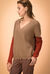 Maglia a V punto pannocchia con cut-out