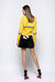 Minigonna effetto vernice stretch con pizzo