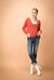 Jeans skinny a vita alta con profilo sfrangiato