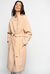 Coat with contrasting edging